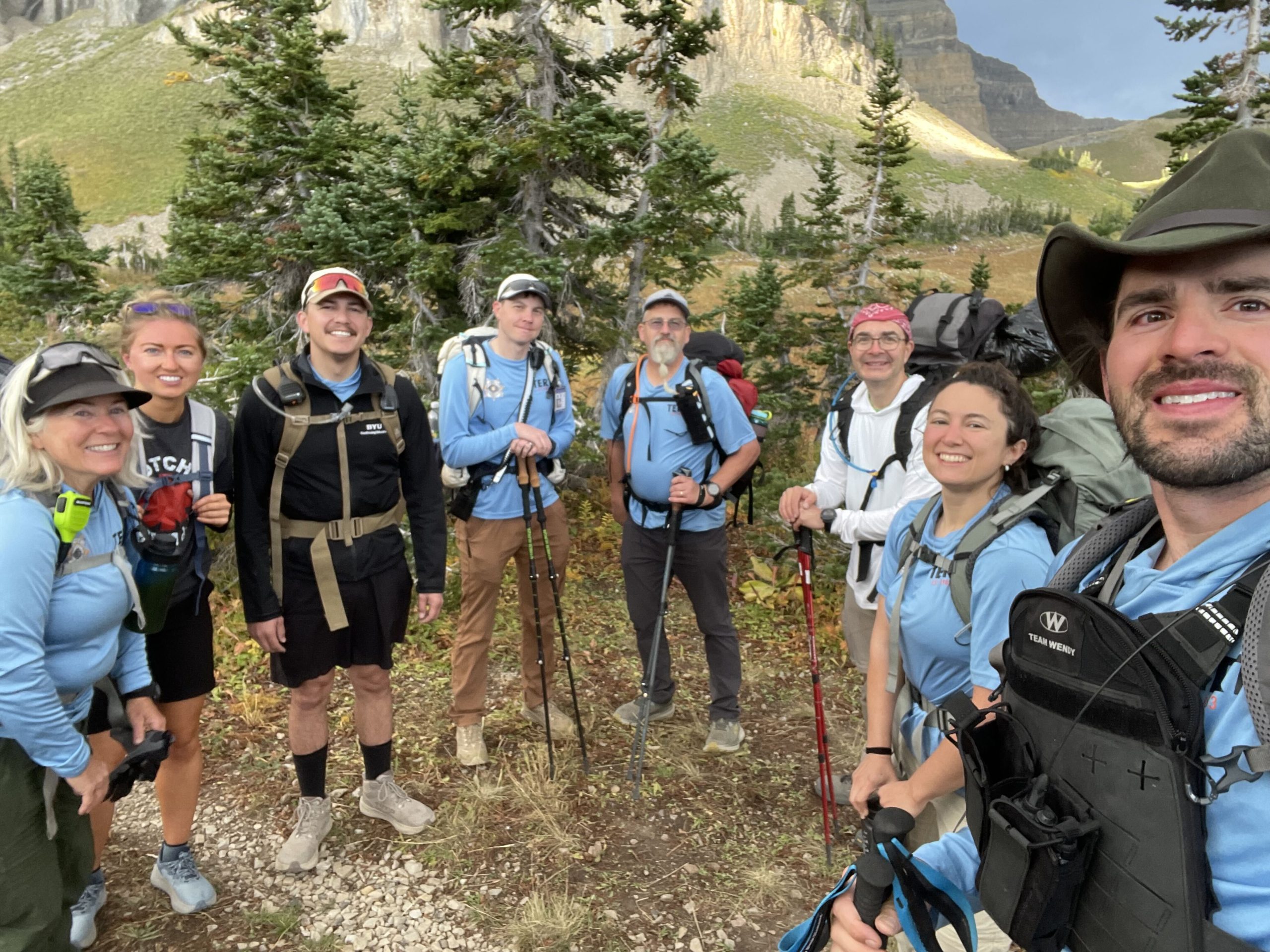 Members stand together before hiking
